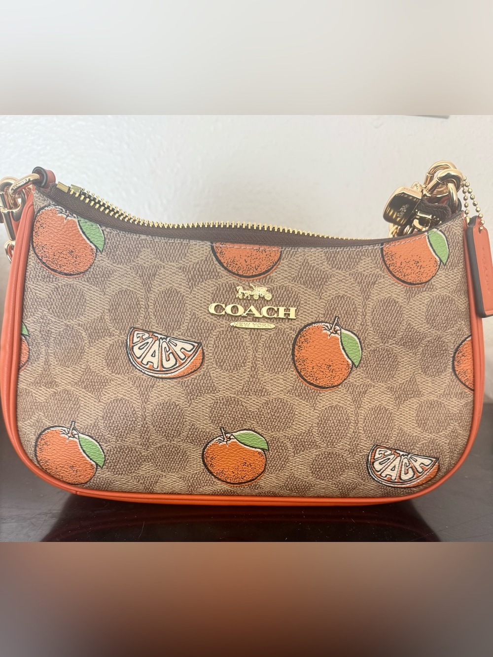 COACH Teri Shoulder bag in Signature Canvas with Orange Print